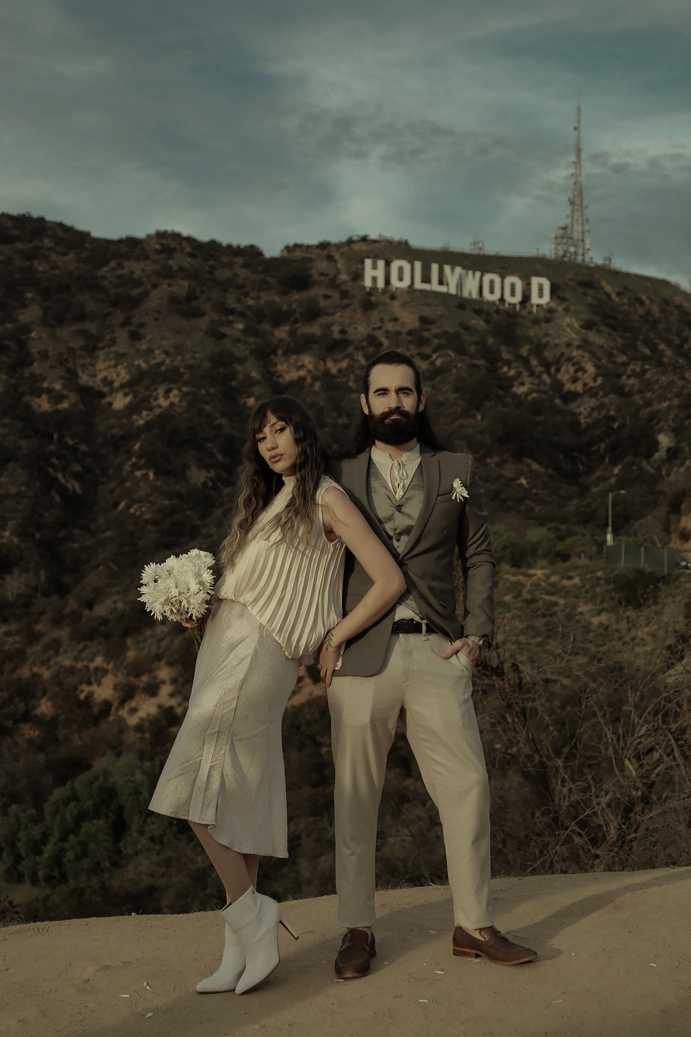 Regis e Becky em frente ao Hollywood Sign